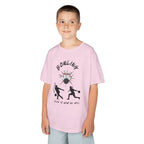 Young boy wearing a youth Gildan 5000B heavy cotton t-shirt in light pink with a Bowling text and graphic