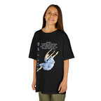 Young girl wearing a youth Gildan 5000B heavy cotton t-shirt in black with a Ballet text and graphic