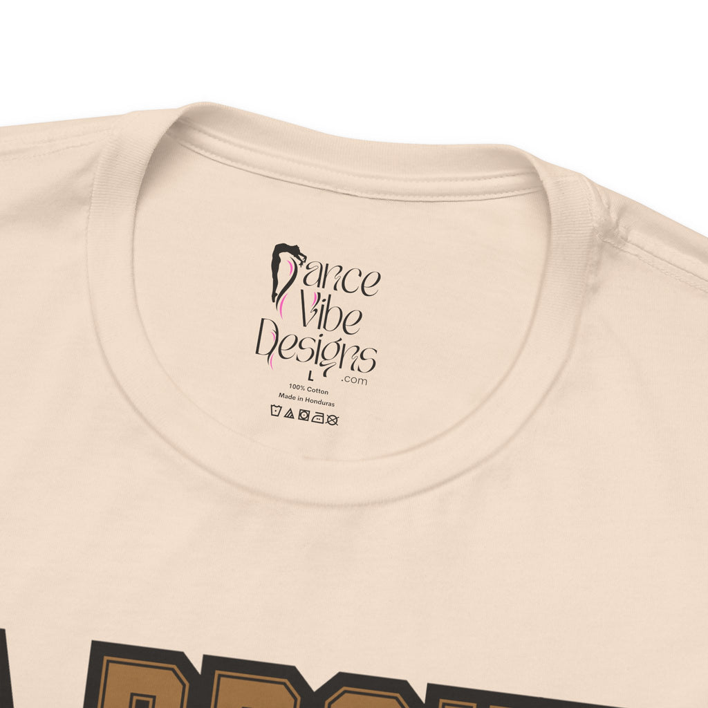 Close-up of a soft cream crewneck t-shirt's inner neck label printed with the brand Dance Vibe Designs logo above the care instructions.