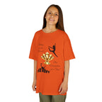 Young girl wearing a youth Gildan 5000B heavy cotton t-shirt in tennessee orange with a Dance Competition theme