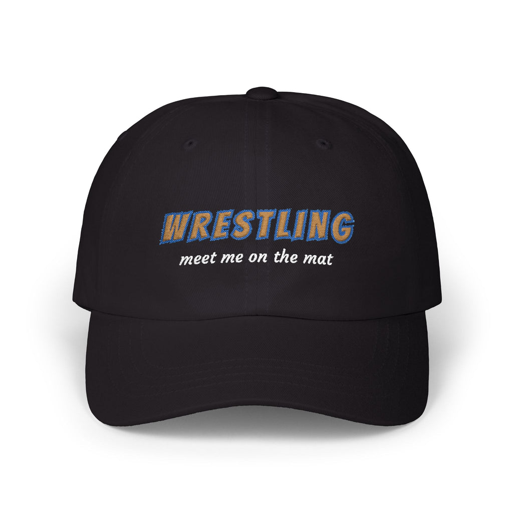 Black cap with an embroidered Wrestling Meet Me On The Mat text.