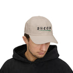 Man wearing a stone embroidered classic dad cap hat with Soccer text and graphic