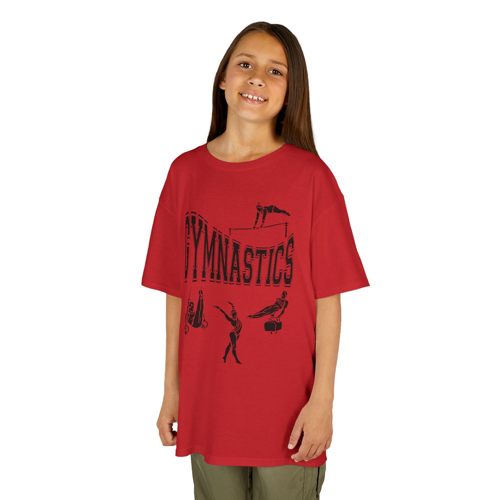 Young girl wearing a youth Gildan 5000B heavy cotton t-shirt in red with a gymnastics text and graphic