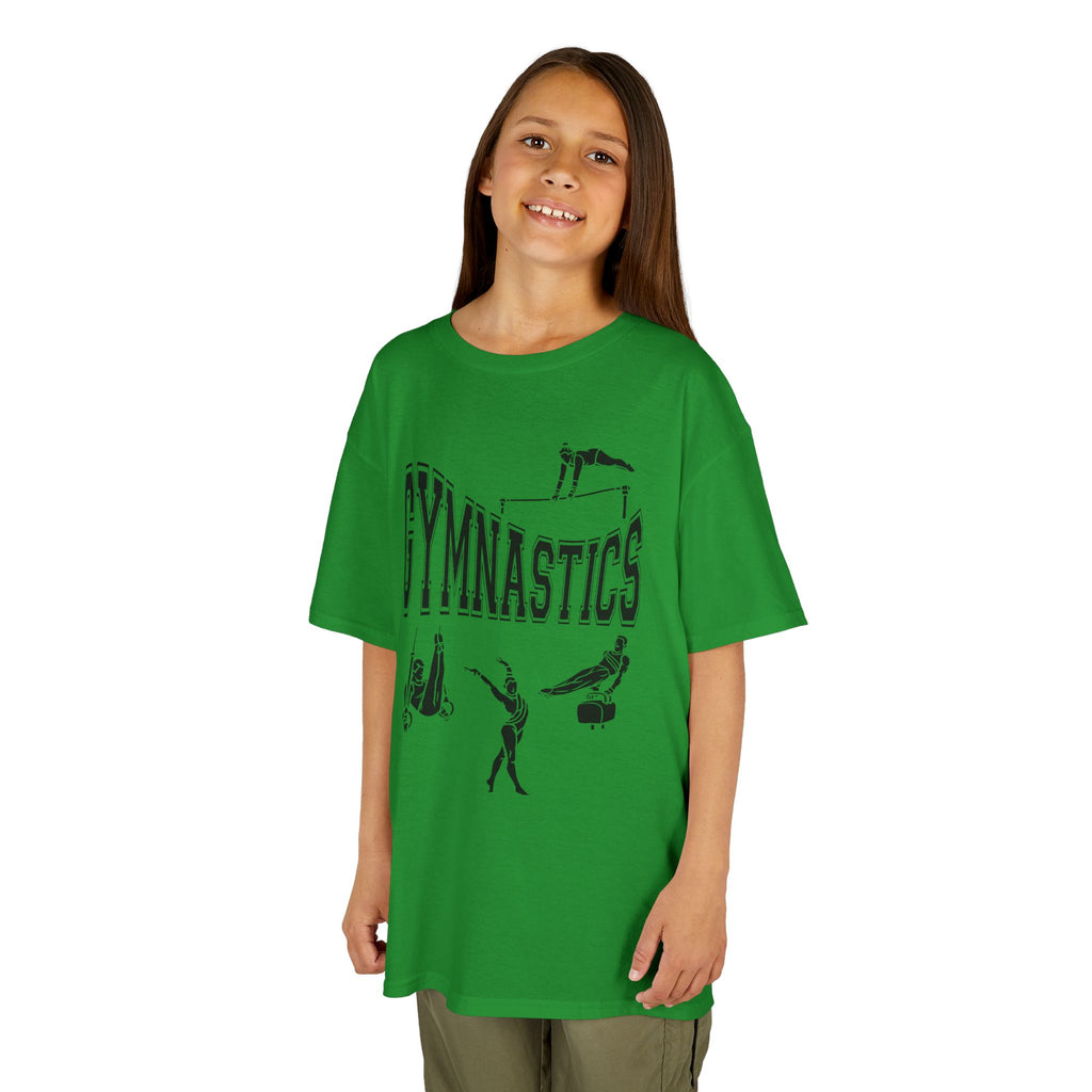 Young girl wearing a youth Gildan 5000B heavy cotton t-shirt in irish green with a gymnastics text and graphic