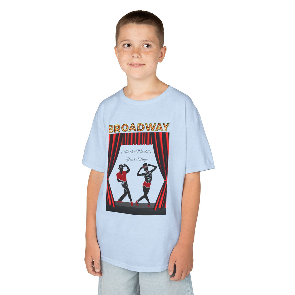 Young boy wearing a youth Gildan 5000B heavy cotton t-shirt in light blue with a Broadway text and graphic