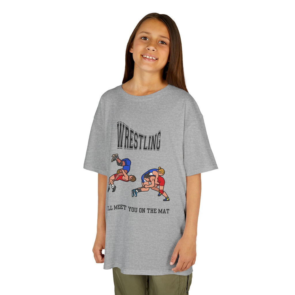 Young girl wearing a youth Gildan 5000B heavy cotton t-shirt in sport grey with a Wrestling text and graphic