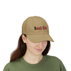 Woman wearing a Khaki embroidered classic dad cap hat with Band Life text