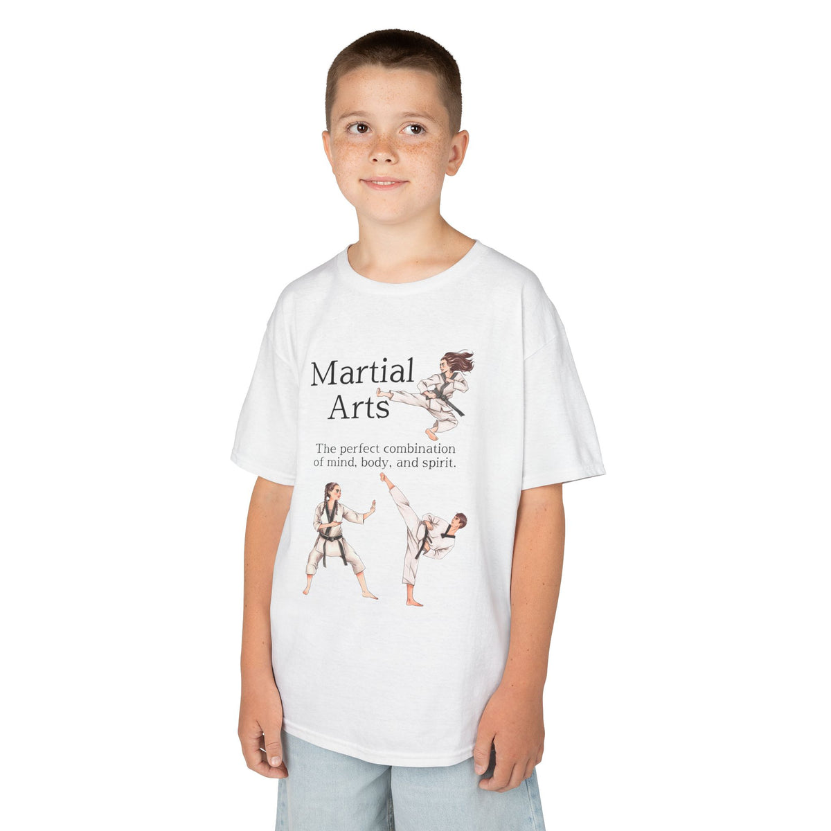 Young boy wearing a youth Gildan 5000B heavy cotton t-shirt in white with a Martial Arts text and graphic