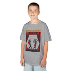 Young boy wearing a youth Gildan 5000B heavy cotton t-shirt in sport grey with a Broadway text and graphic