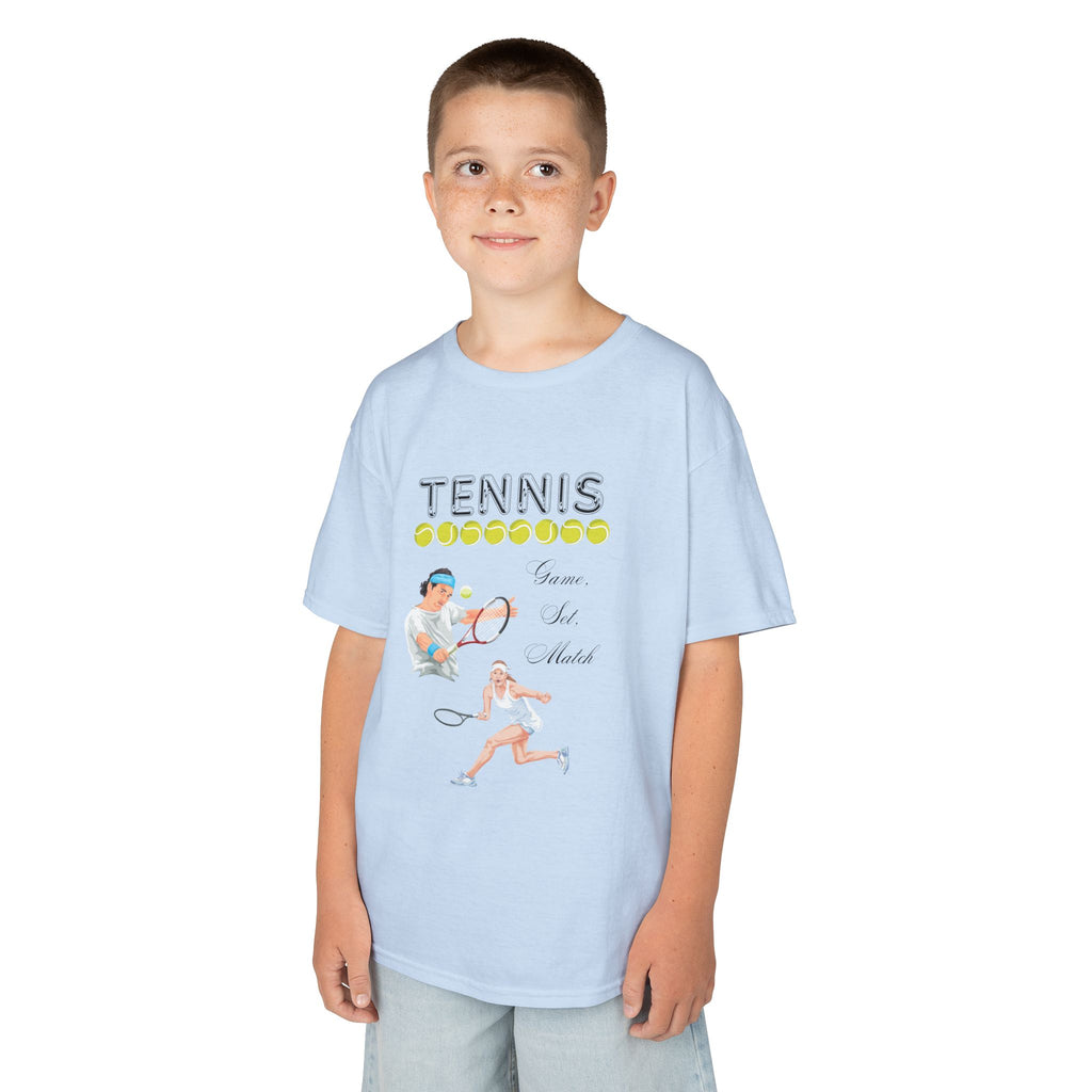 Young boy wearing a youth Gildan 5000B heavy cotton t-shirt in light blue with a Tennis text and graphic