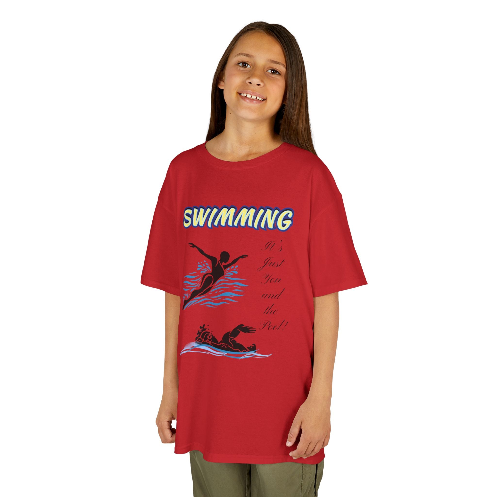 Young girl wearing a youth Gildan 5000B heavy cotton t-shirt in red with a Swimming text and graphic