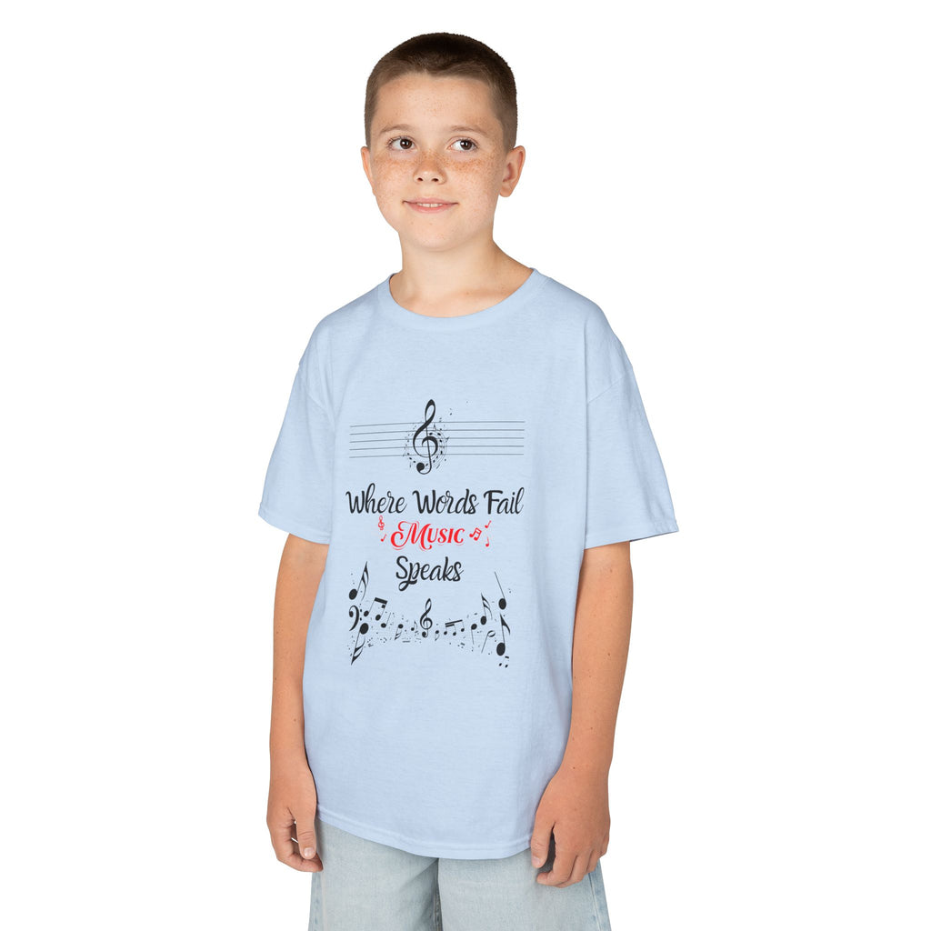 Young boy wearing a youth Gildan 5000B heavy cotton t-shirt in light blue with a Where Words Fail Music Speaks text and graphic