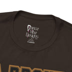 Close-up of a brown crewneck t-shirt's inner neck label printed with the brand Dance Vibe Designs logo above the care instructions.