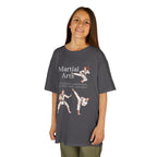 Young girl wearing a youth Gildan 5000B heavy cotton t-shirt in charcoal with a Martial Arts text and graphic
