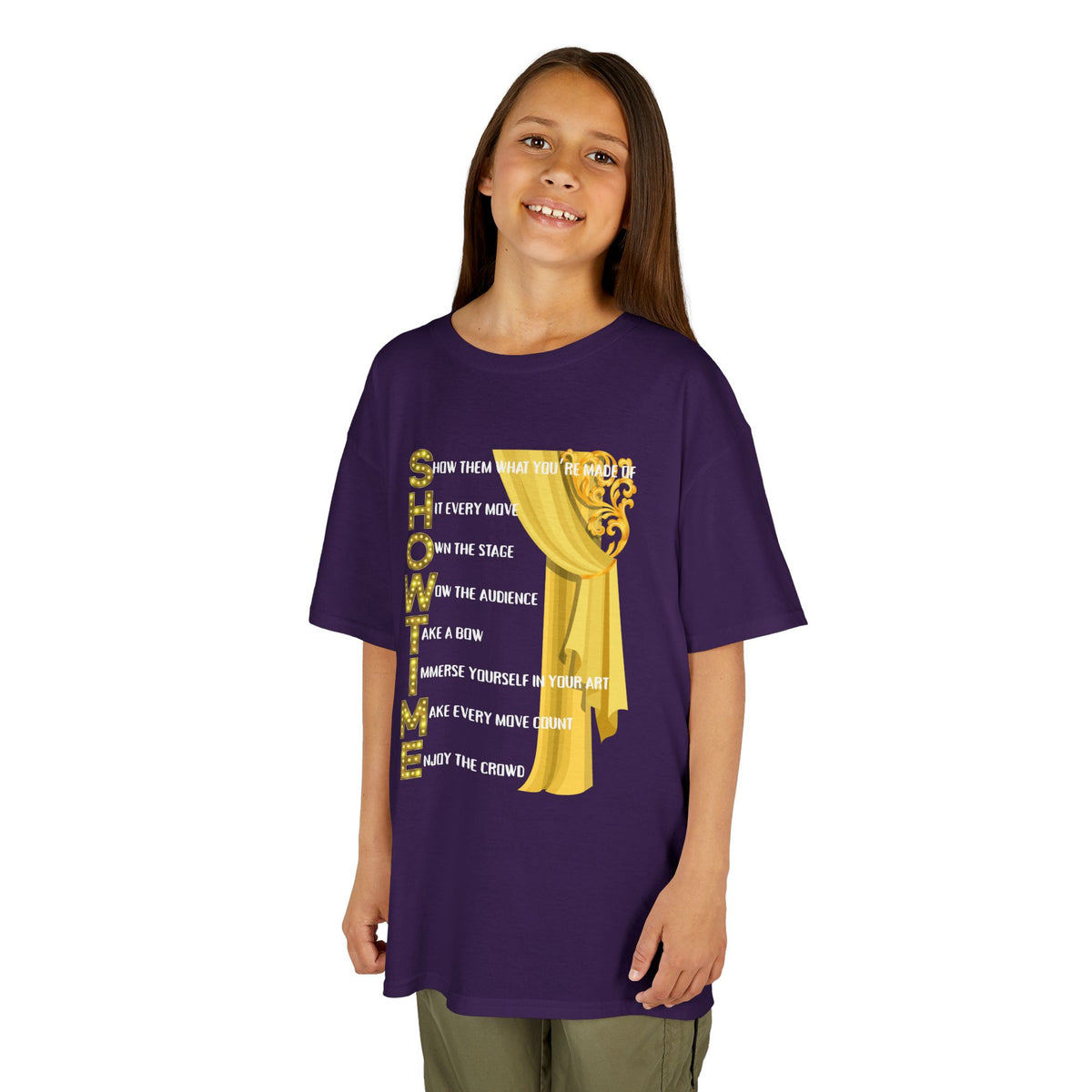 Young girl wearing a youth Gildan 5000B heavy cotton t-shirt in purple with a Showtime text and graphic 