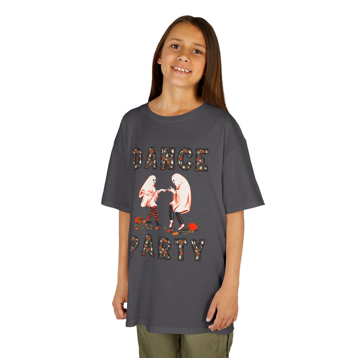 Young girl wearing a youth Gildan 5000B heavy cotton t-shirt in charcoal with a Halloween Dance Party theme