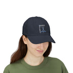 Woman wearing a navy cap with an embroidered Hockey text and logo.