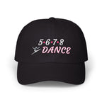 A black baseball cap featuring the text 5-6-7-8 DANCE embroidered on the front, with a small dancer silhouette at the bottom.