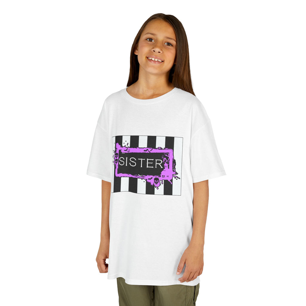 A young girl wearing a white Beetlejuice inspired Sister Halloween shirt.