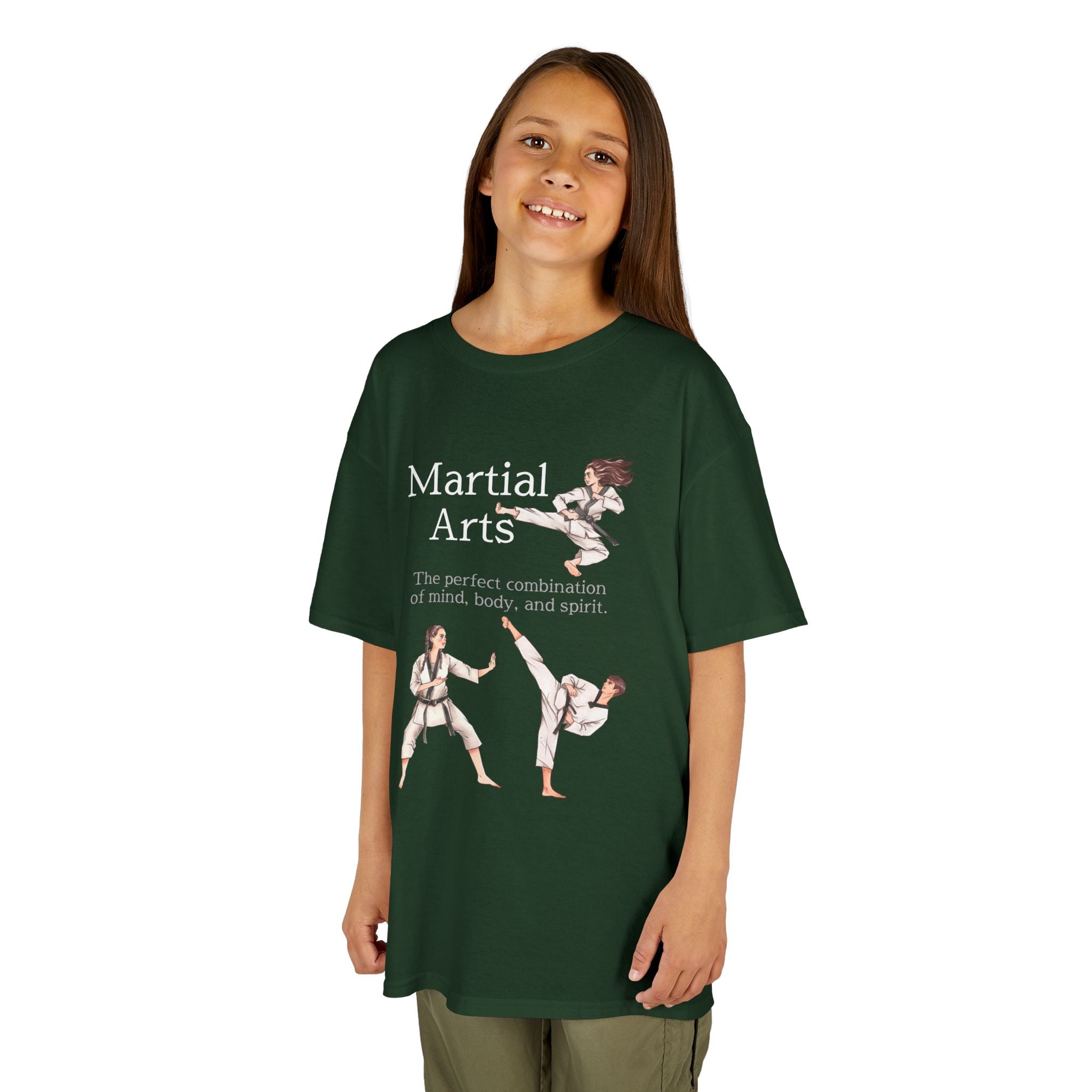 Young girl wearing a youth Gildan 5000B heavy cotton t-shirt in forest green with a Martial Arts text and graphic