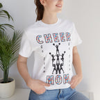 A woman wearing a white graphic t-shirt with CHEER GO TEAM MOM text and graphic on the front.