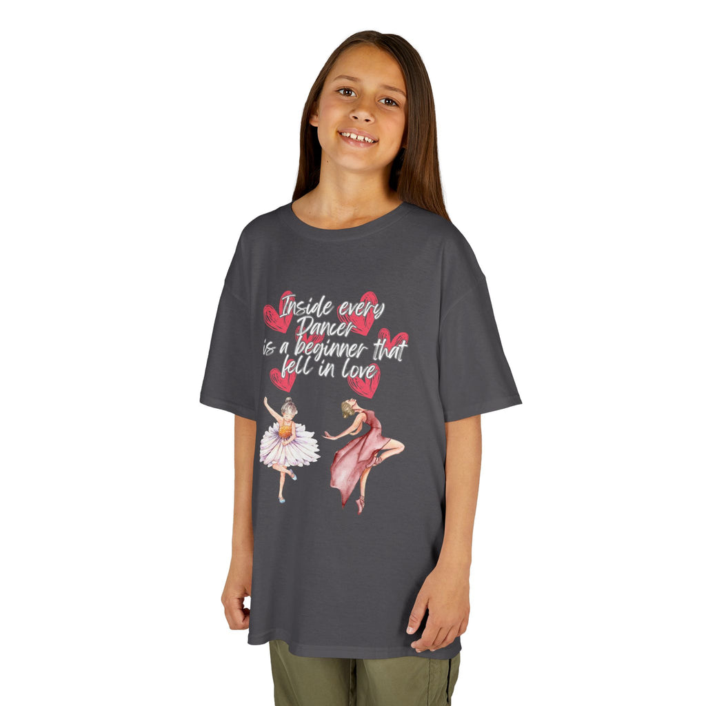 Young girl wearing a youth Gildan 5000B heavy cotton t-shirt in charcoal with an Inside Every Dancer is a Beginner that Fell in Love theme