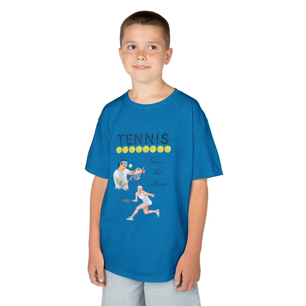 Young boy wearing a youth Gildan 5000B heavy cotton t-shirt in sapphire with a Tennis text and graphic