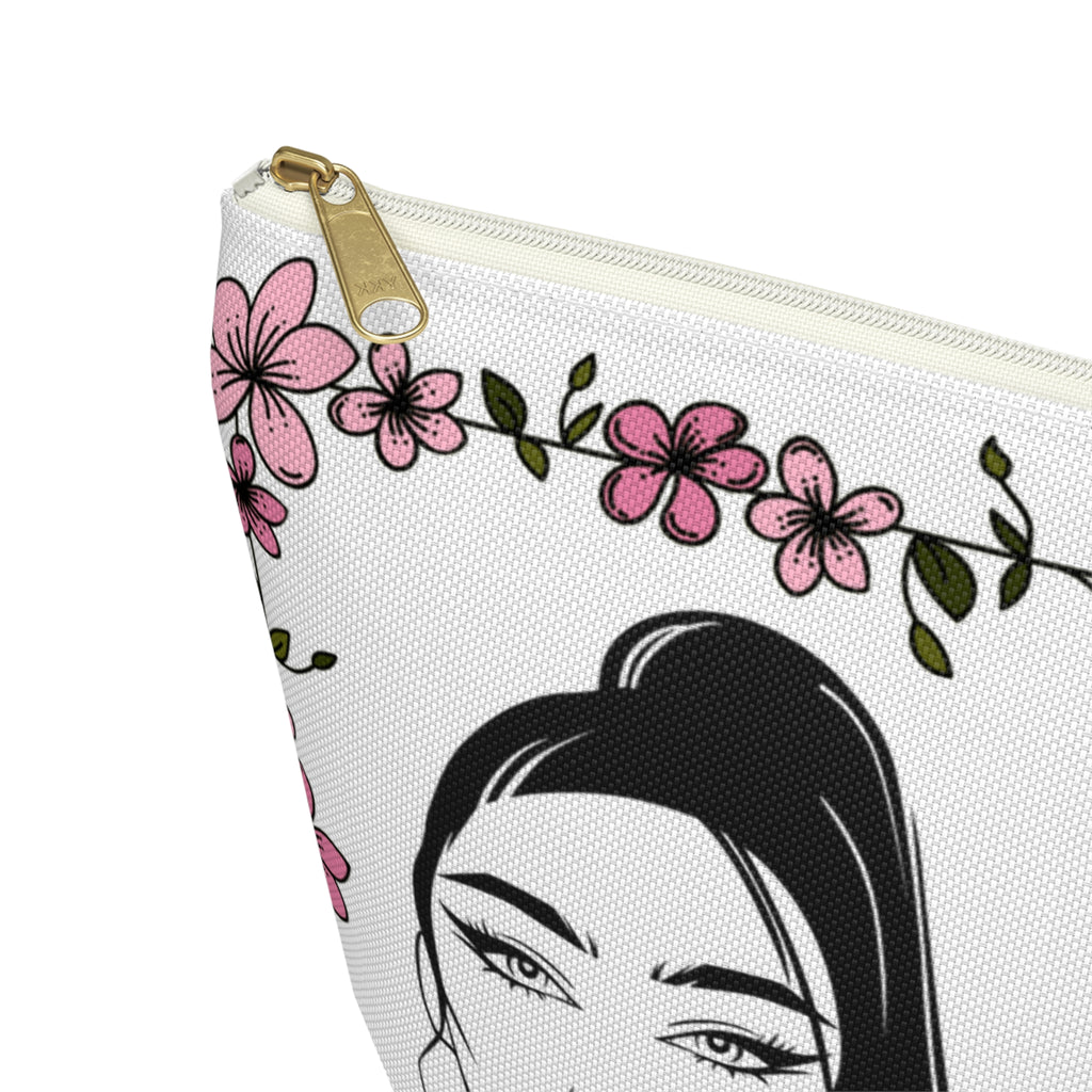 Stage Ready make up bag with floral design and face illustration on a white background white zipper close up