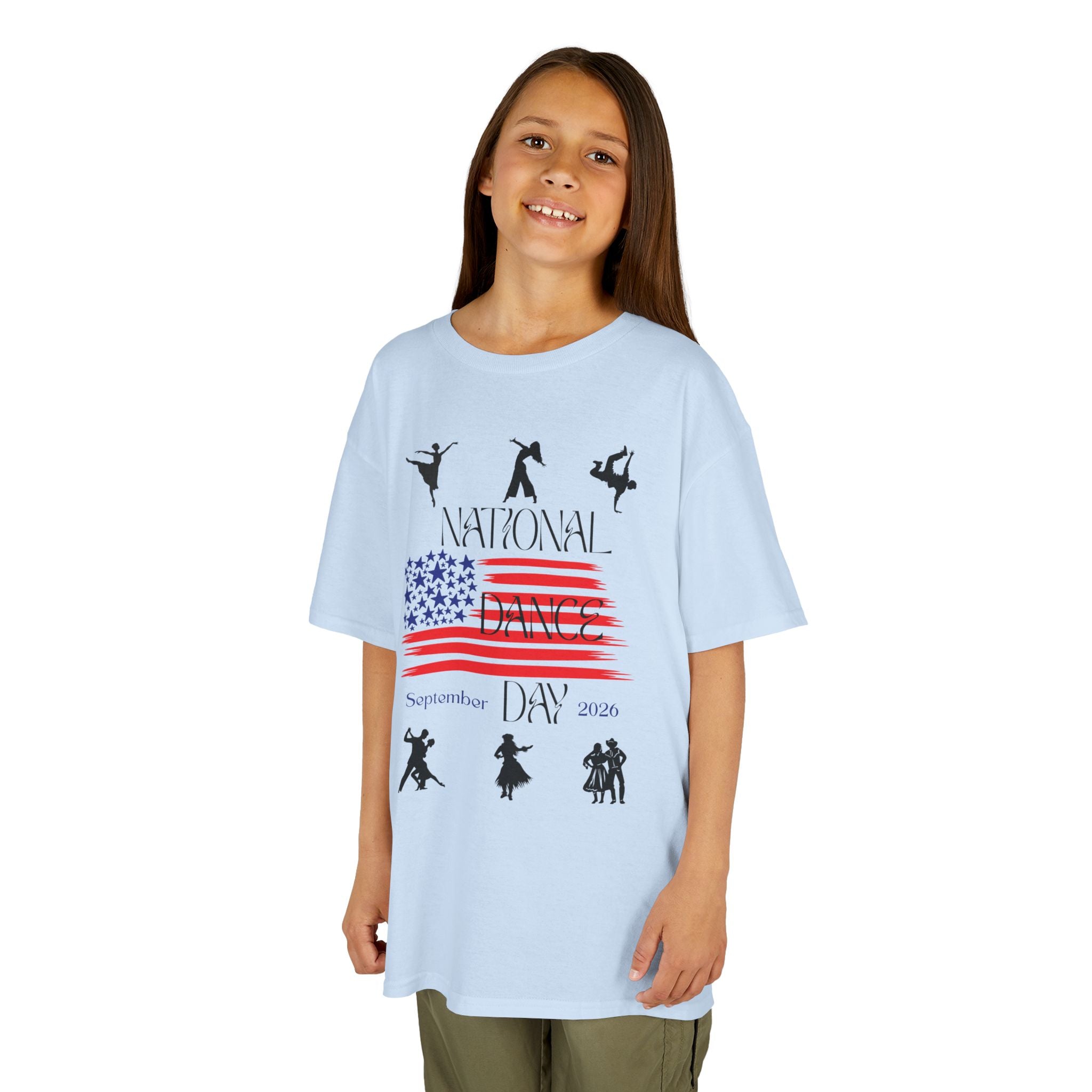Young girl wearing a youth Gildan 5000B heavy cotton t-shirt in light blue with a National Dance Day theme