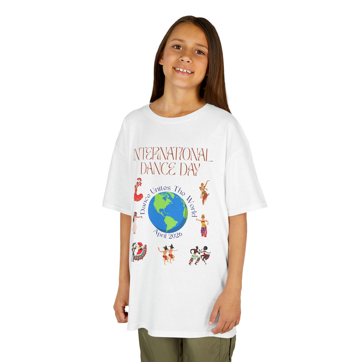 Young girl wearing a youth Gildan 5000B heavy cotton t-shirt in white with an International Dance Day theme 