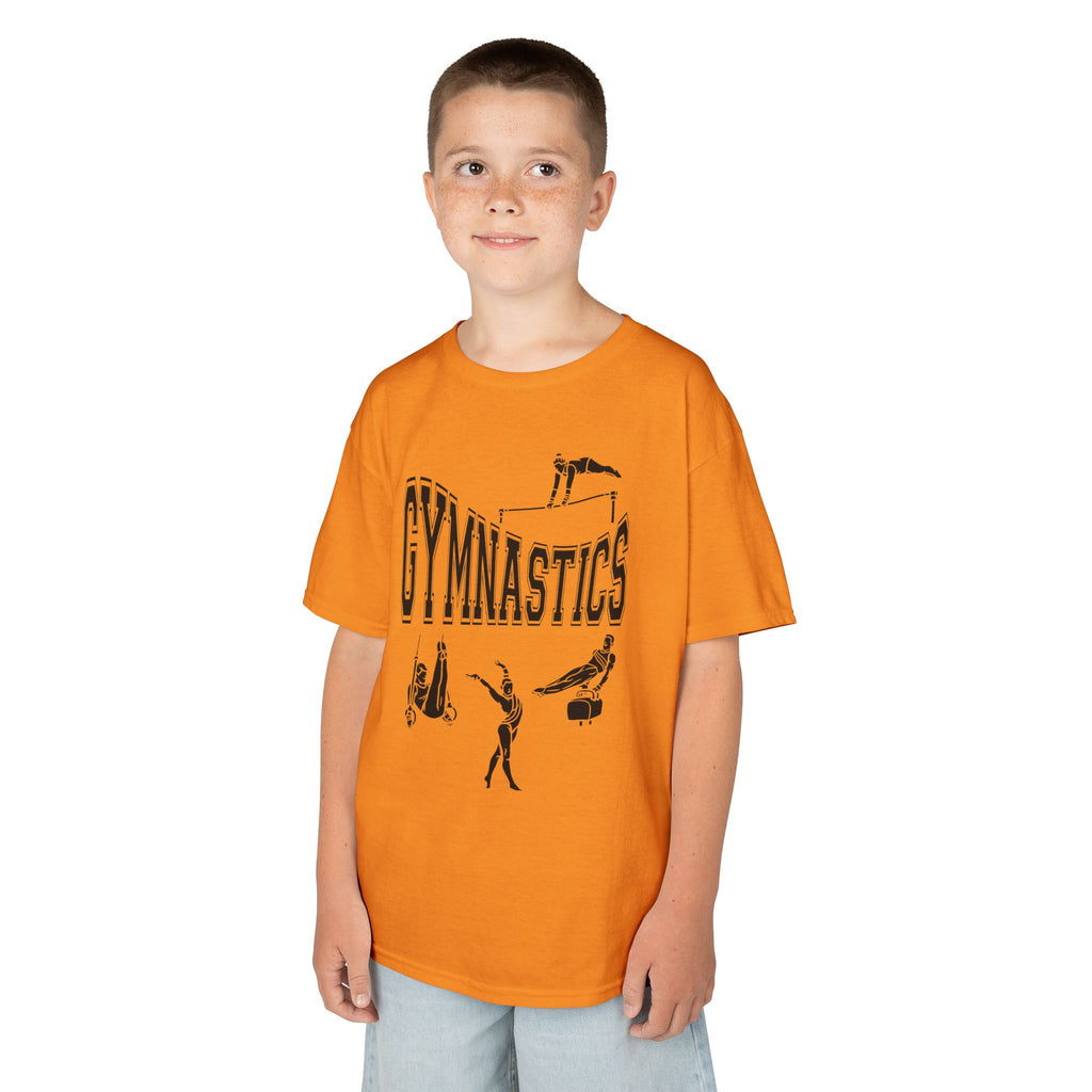 Young boy wearing a youth Gildan 5000B heavy cotton t-shirt in tennessee orange with a gymnastics text and graphic