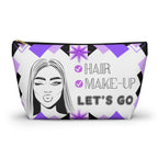 Hair Make up Let's go themed travel pouch with geometric design and face illustration on a white background with black zipper