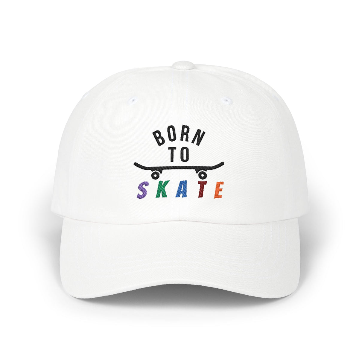 A white baseball cap featuring a graphic on the front that reads BORN TO SKATE with a black skateboard silhouette and colorful lettering for SKATE.