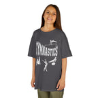 Young girl wearing a youth Gildan 5000B heavy cotton t-shirt in charcoal with a gymnastics text and graphic
