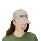 Woman wearing a stone embroidered classic dad cap hat with a Cheer text and graphic