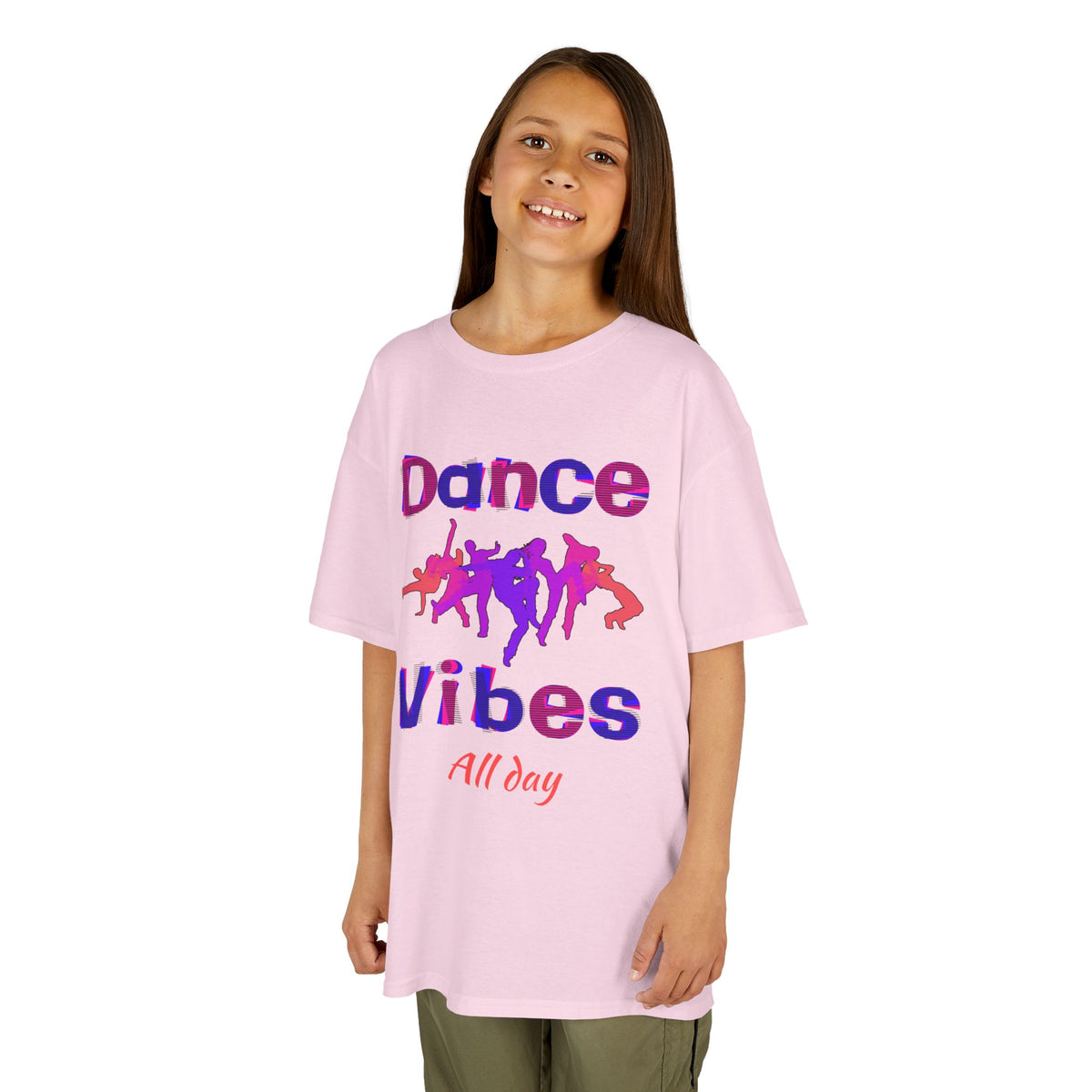 Young girl wearing a youth Gildan 5000B heavy cotton t-shirt in light pink with a Dance Vibes All Day text and graphic