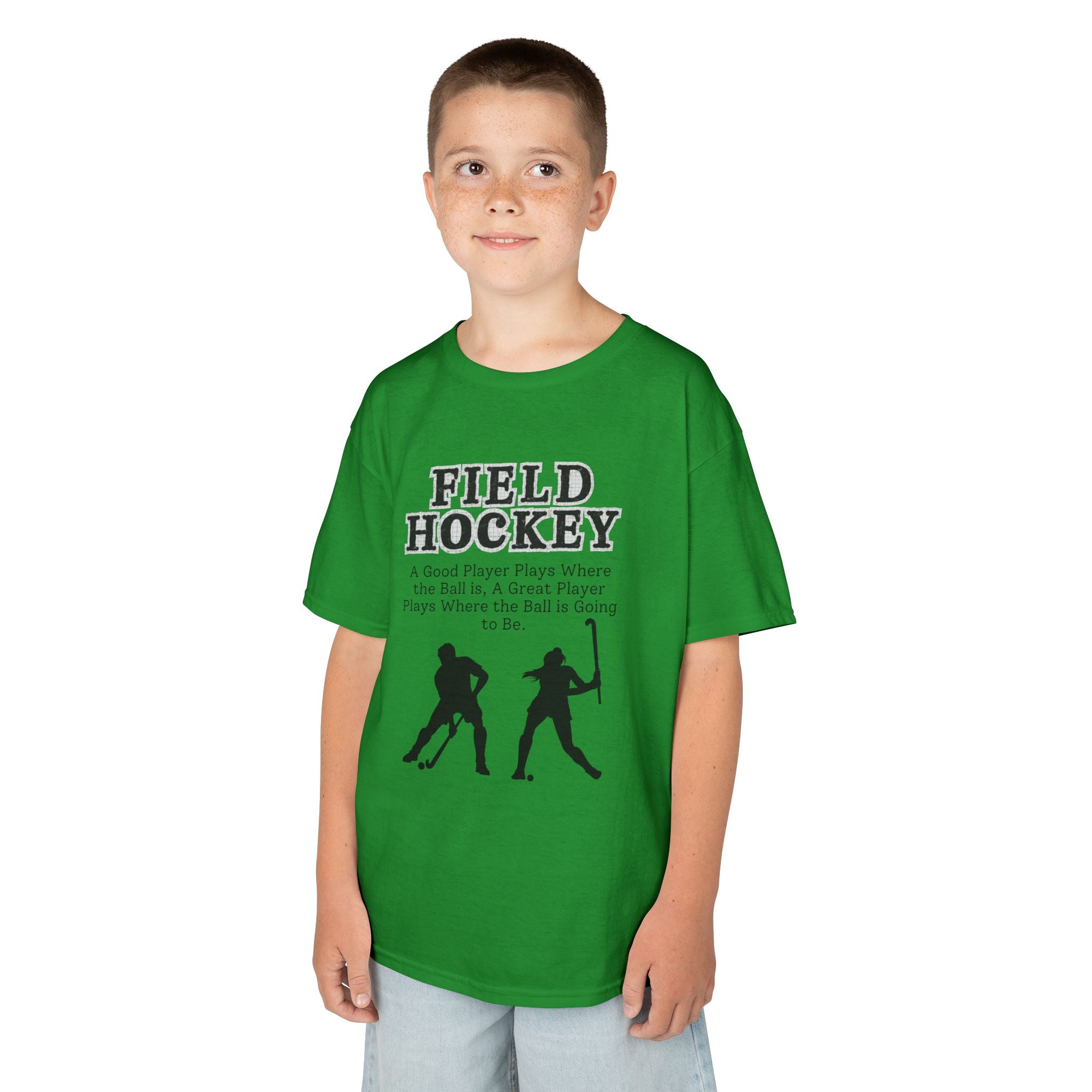 Young boy wearing a youth Gildan 5000B heavy cotton t-shirt in irish green with a Field Hockey text and graphic