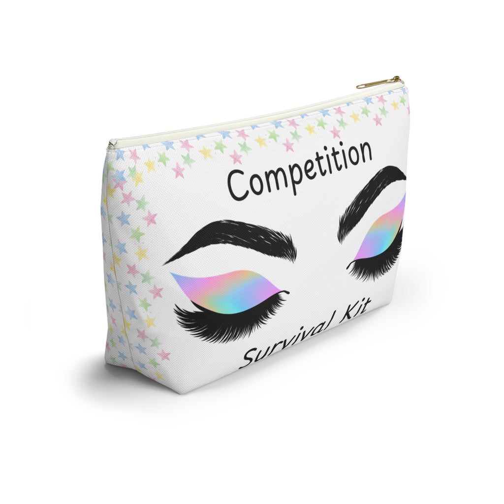 Makeup bag featuring eye design with rainbow make up and Competition Survival Kit text on a white background white zipper side view