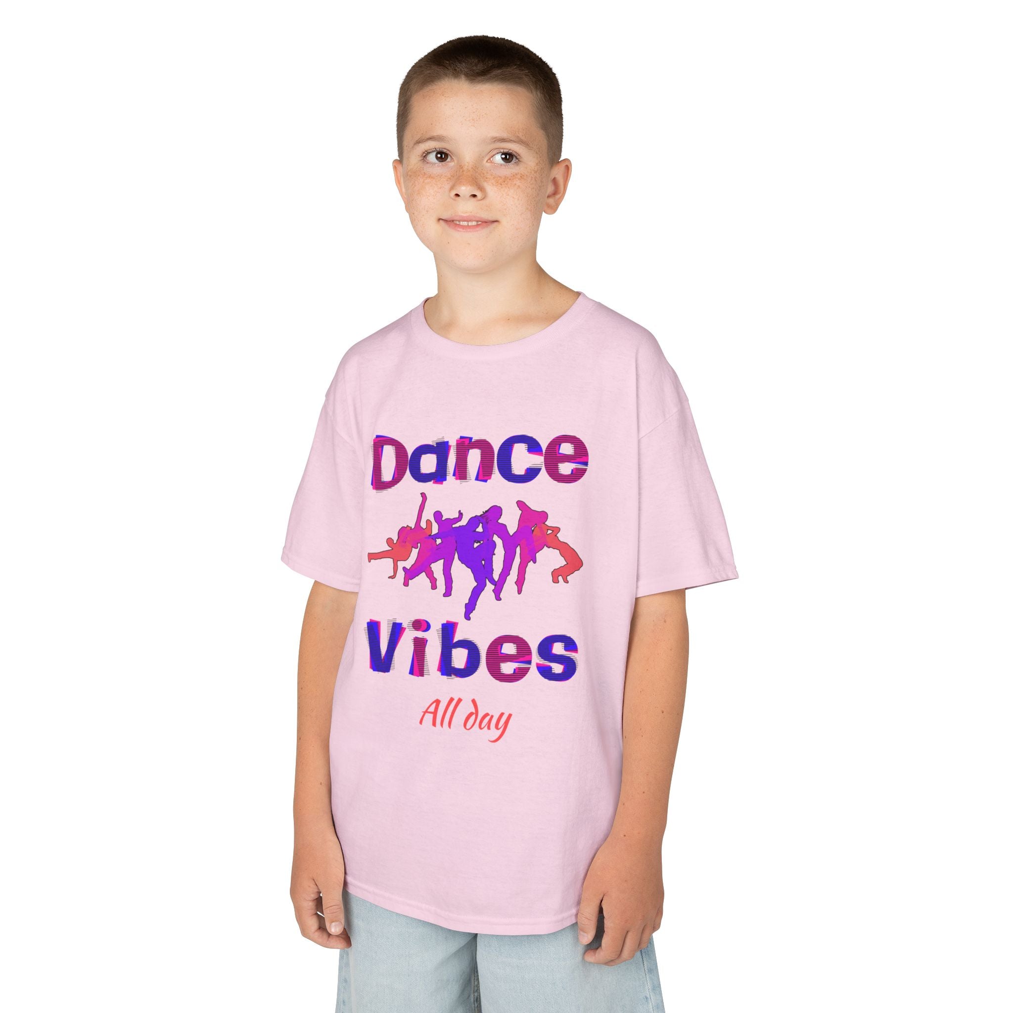Young boy wearing a youth Gildan 5000B heavy cotton t-shirt in light pink with a Dance Vibes All Day text and graphic