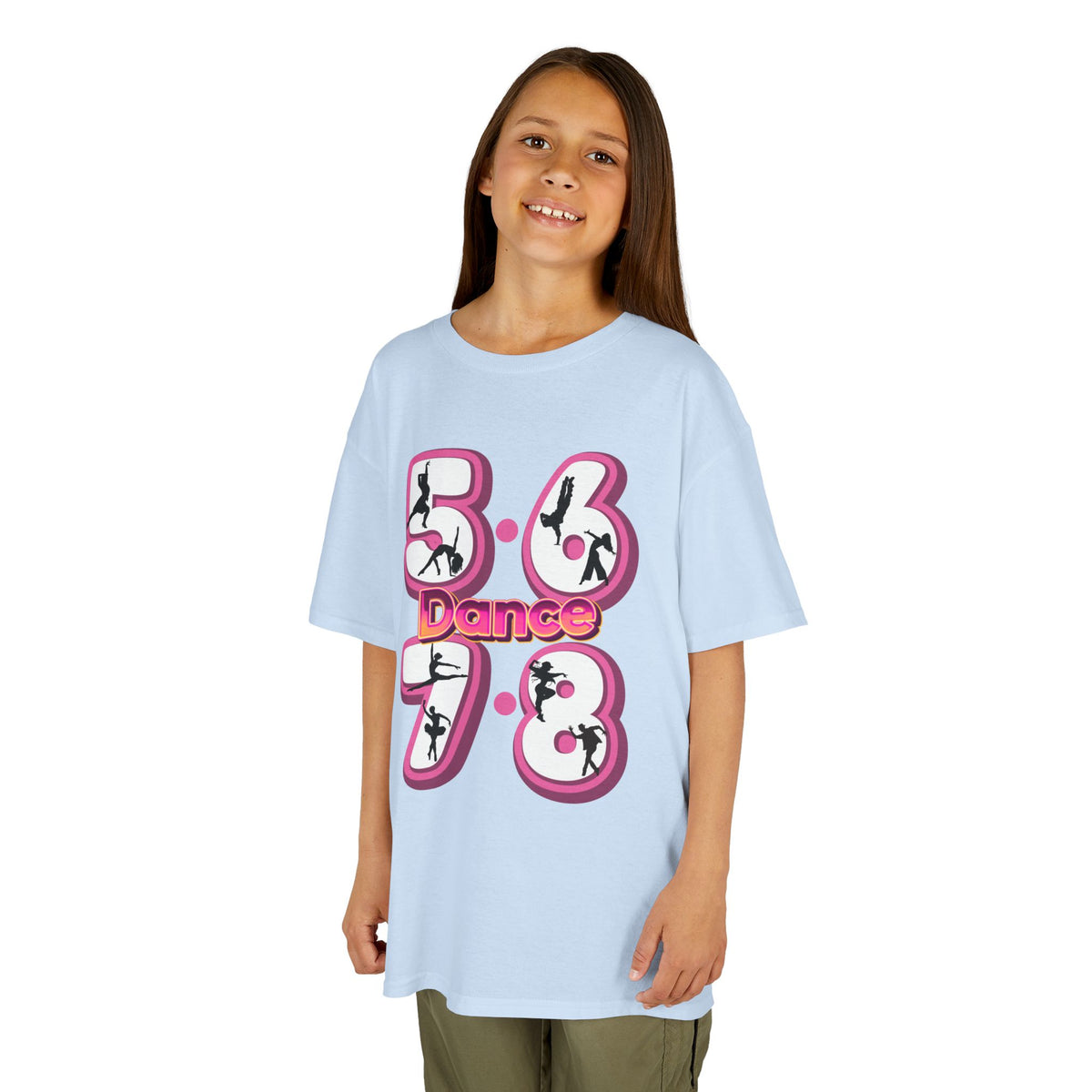 Young girl wearing a Gildan 5000B heavy cotton t-shirt in light blue with a 5678 Dance text and graphic