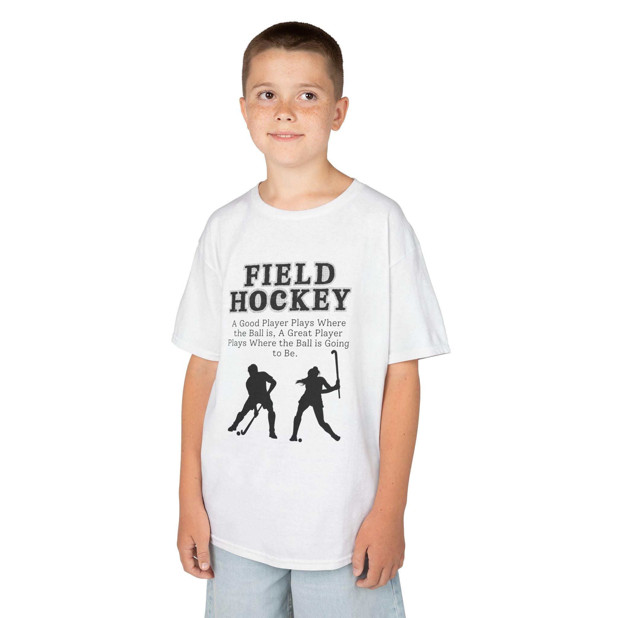 Young boy wearing a youth Gildan 5000B heavy cotton t-shirt in white with a Field Hockey text and graphic