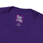 Close up view of a Dance Vibe Designs custom neck label above t-shirt care instructions.