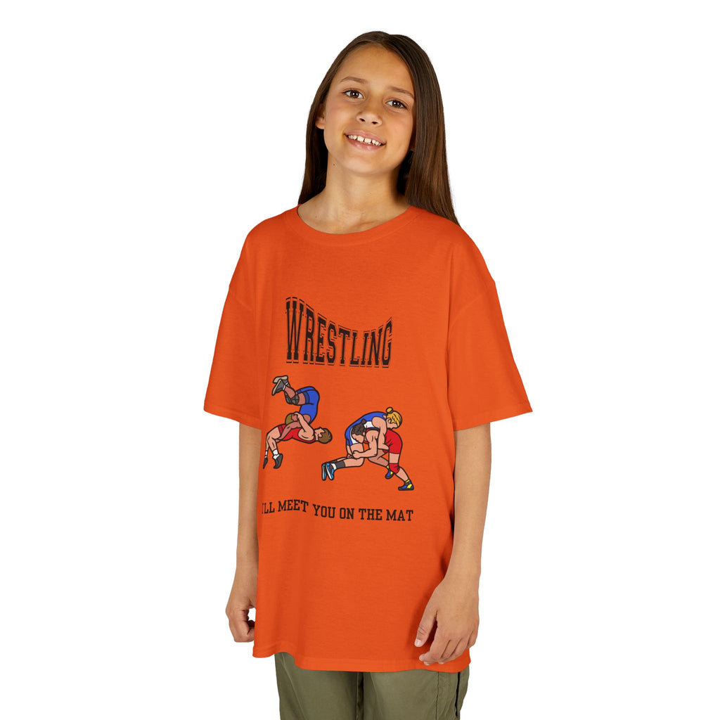 Young girl wearing a youth Gildan 5000B heavy cotton t-shirt in orange with a Wrestling text and graphic