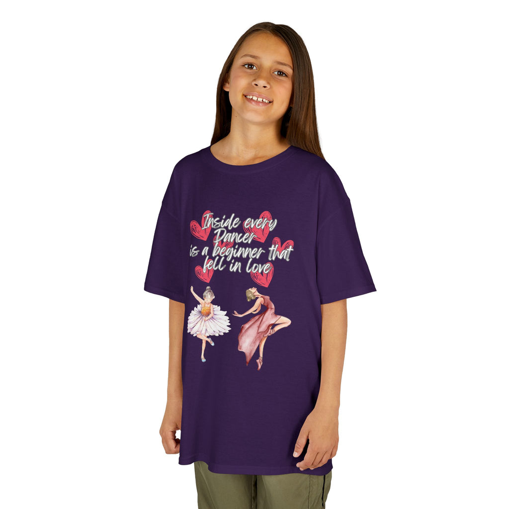 Young girl wearing a youth Gildan 5000B heavy cotton t-shirt in purple with an Inside Every Dancer is a Beginner that Fell in Love theme