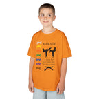 Young boy wearing a youth Gildan 5000B heavy cotton t-shirt in tennessee orange with a Karate text and graphic