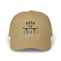 A khaki baseball cap featuring a graphic on the front that reads BORN TO SKATE with a black skateboard silhouette and colorful lettering for SKATE.