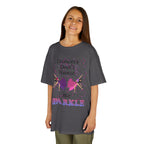 Young girl wearing a youth Gildan 5000B heavy cotton t-shirt in charcoal with a Dancer's Don't Sweat We Sparkle text and graphic