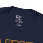 Close-up of a navy crewneck t-shirt's inner neck label printed with the brand Dance Vibe Designs logo above the care instructions.