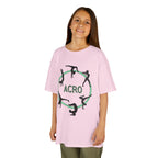 Young girl wearing a youth Gildan 5000B heavy cotton t-shirt in light pink with an Acro Gymnastics theme