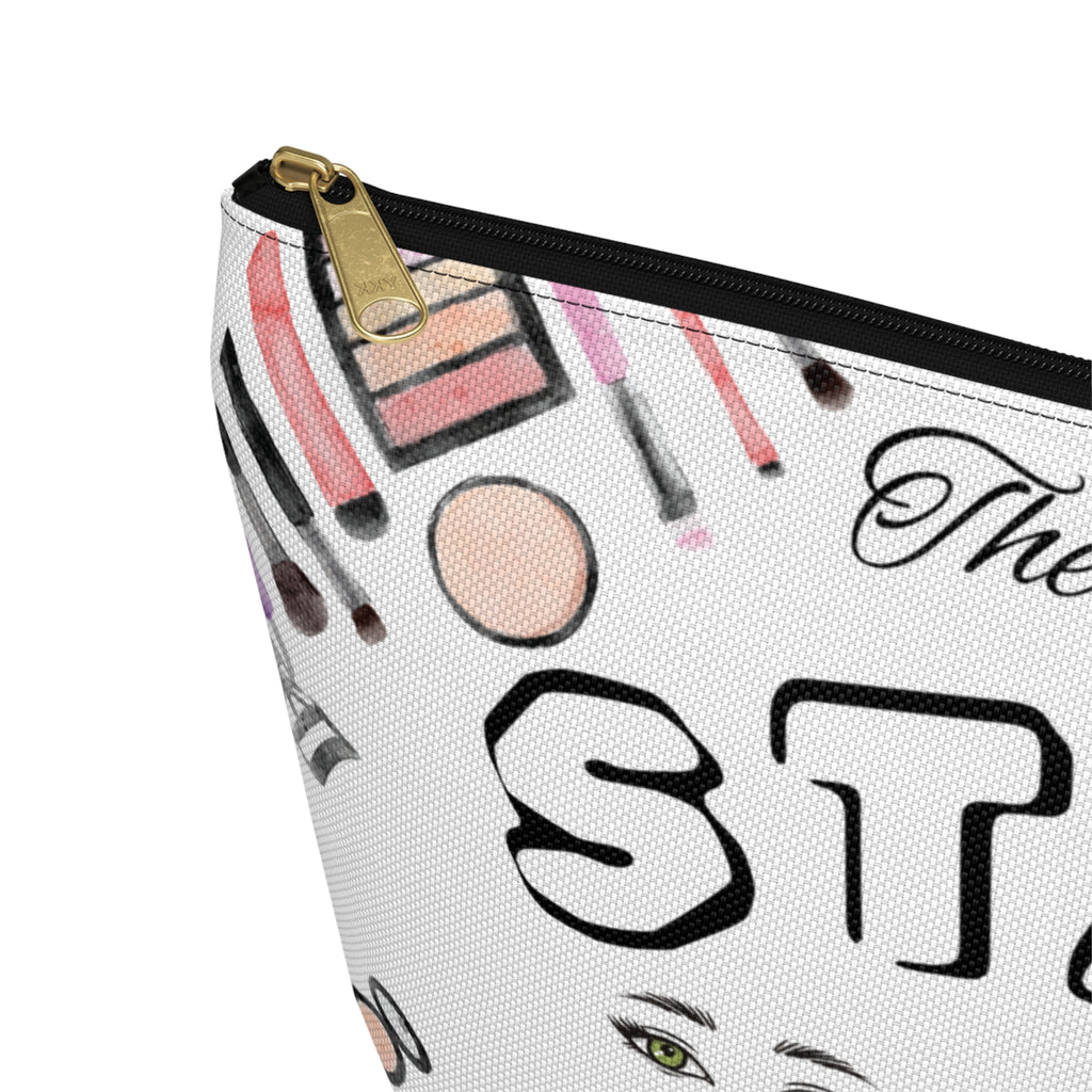 Makeup-themed pouch with cosmetic illustrations and text on a white background close up of black zipper